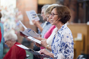 Anglican Church supporters in Coffs Harbour celebrate the Christmas Bowl with an ecumenical carol 